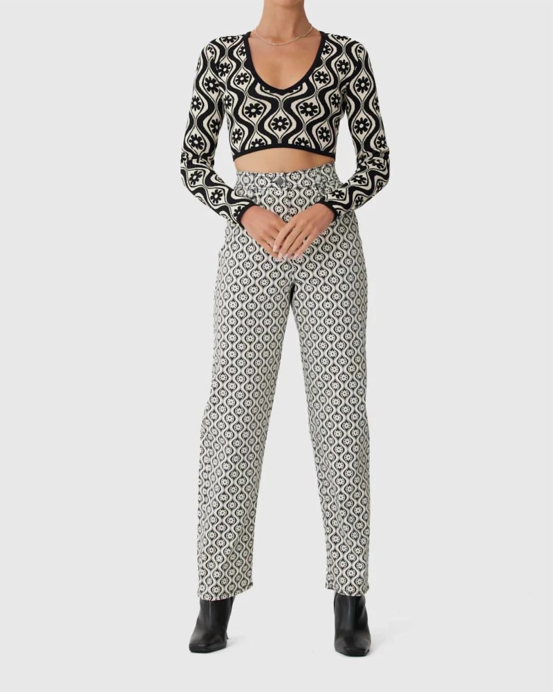 Front of a model wearing a size L Quinn Long Sleeve Knit Top in Cream Retro Floral in Cream Retro Floral by finders keepers. | dia_product_style_image_id:345925